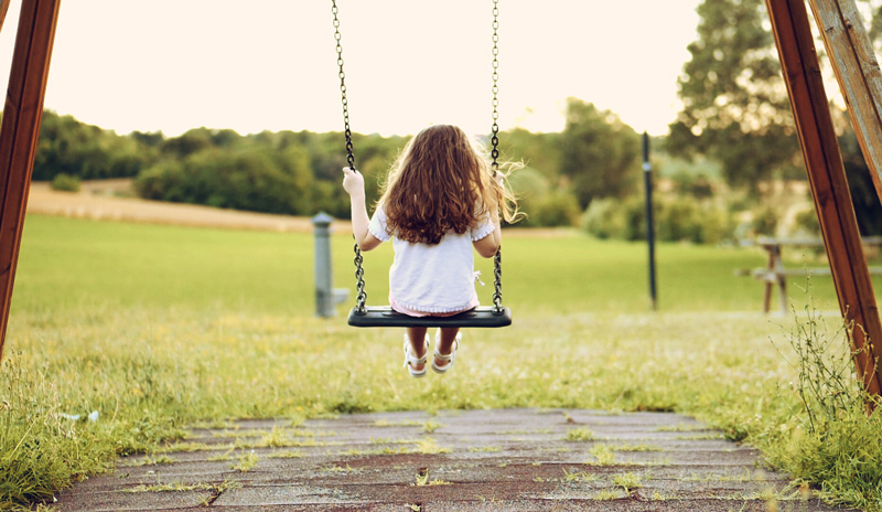 Ex-is-behind-on-child-support-Blog Child playing on swing