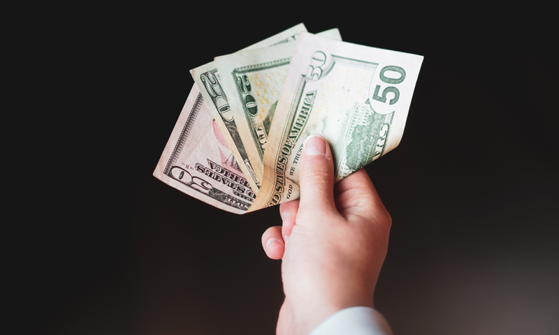 Cheated-by-Contractor-Blog Hand holding money