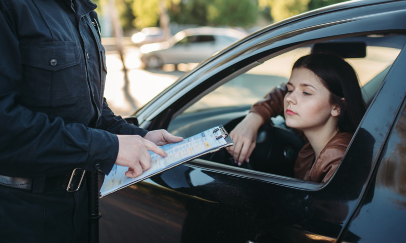 Miranda-Rights-Part-2-Blog Police officer pulling over a woman