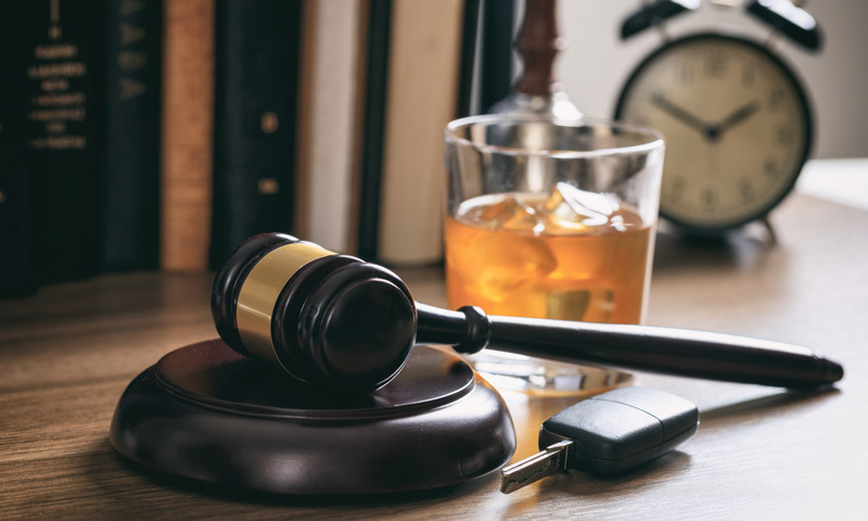 Legal gavel and alcohol